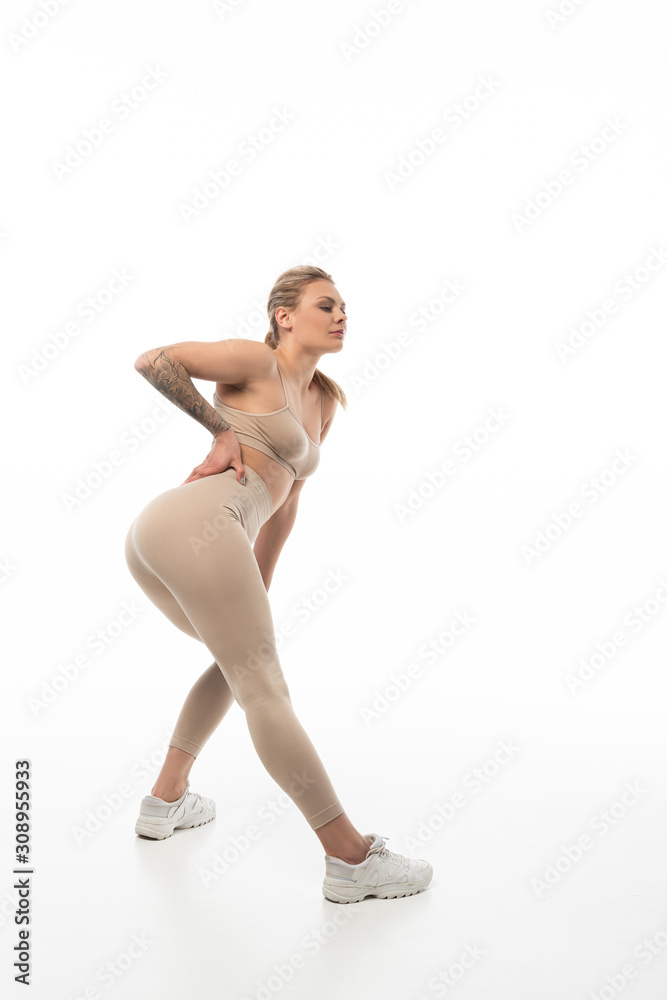 Fototapeta premium sexy blonde twerk dancer posing isolated on white