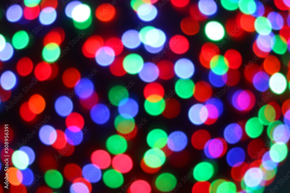 Defocused Christmas background with colorful bokeh lights. Defocused Christmas background with colorful bokeh lights.