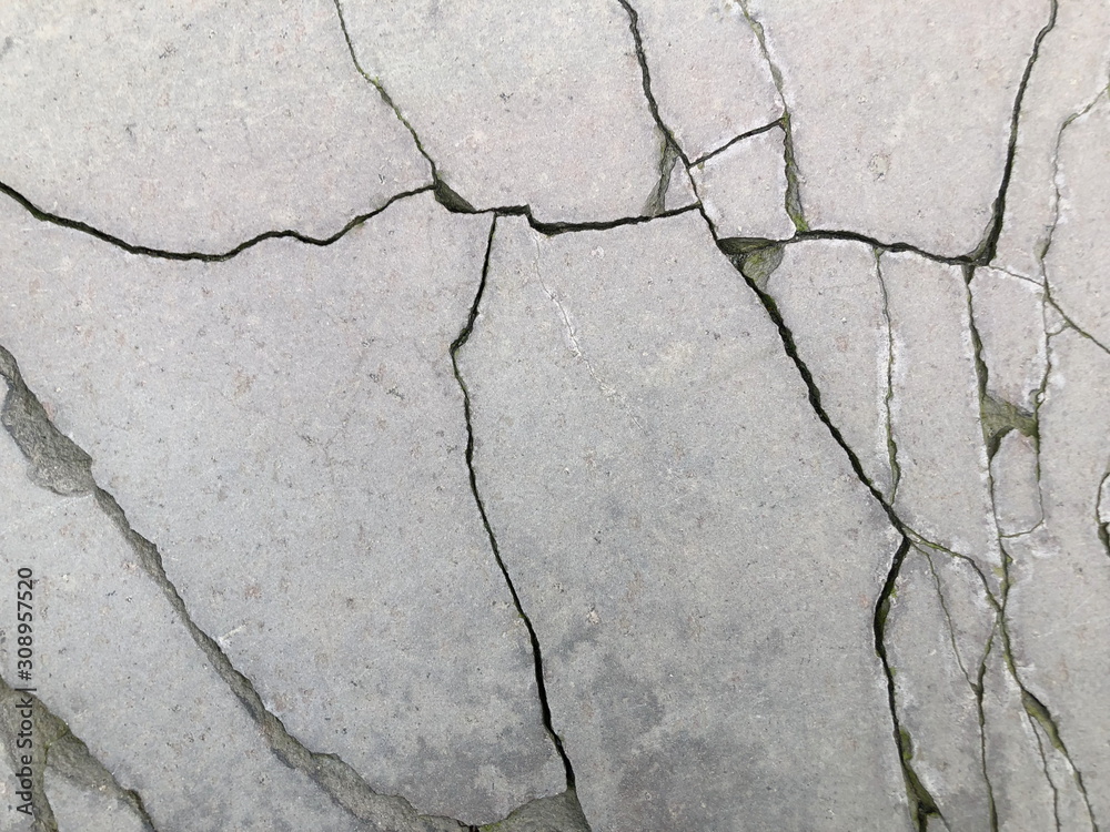 Obraz premium Cracked concrete texture closeup background