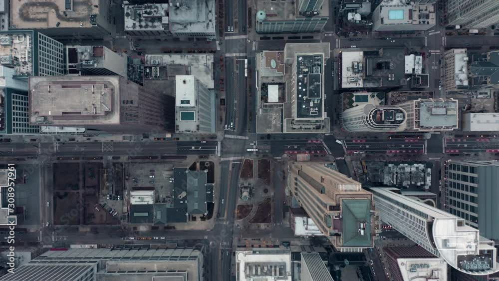 Aerial vertical overhead view of main shopping destination street in Chicago. Skyscrapers with rooftops Aerial vertical overhead view of main shopping destination street in Chicago. Skyscrapers with rooftops