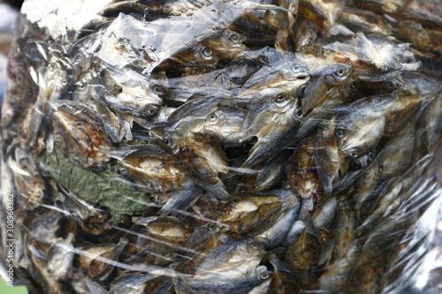 Bunch of dried fish called Ayungin or Silver Perch photo