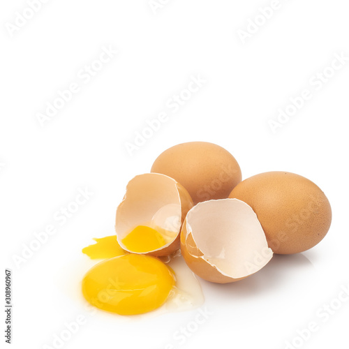 Chicken eggs and cracked egg with yolk isolated on white background.Nutrition concept