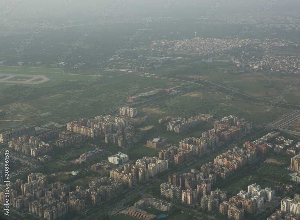 Aerial view of cityscape with air pollution