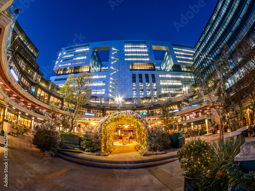 Wide view of  Broadgate Circle illuminated with Christmas decorations outdoor  in winter seasonal holiday in London, UK photo