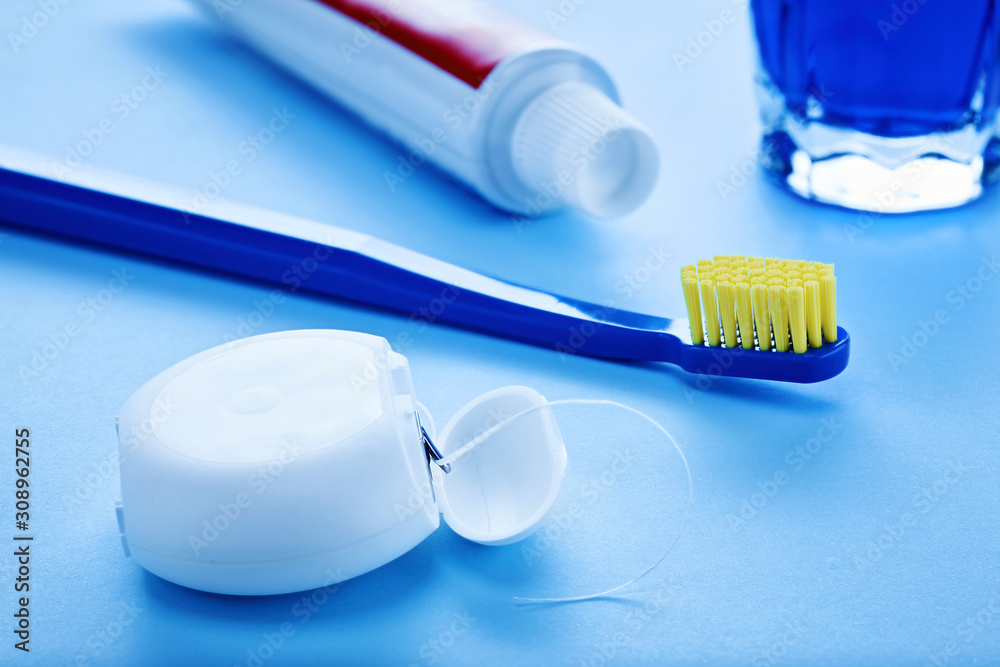 Dental floss, toothbrush, toothpaste, and mouthwash Dental floss, toothbrush, toothpaste, and mouthwash