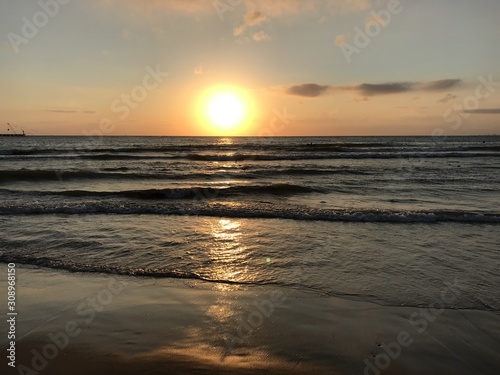 Sunset during the surf on the Black sea. Mobile photo in natural daylight. Russia