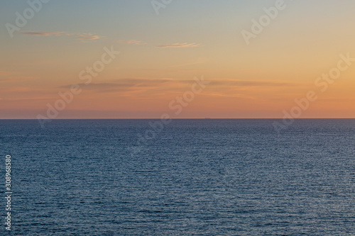 Sunset over the ocean, at Seaford in Sussex