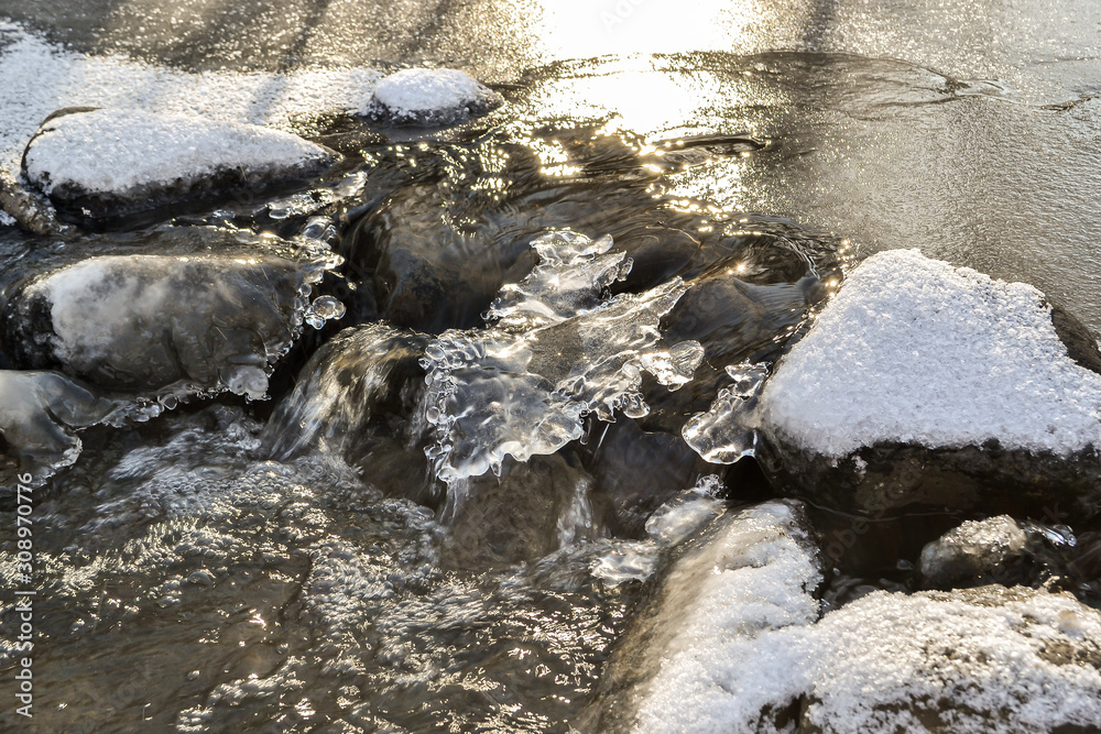 small river begins to freeze