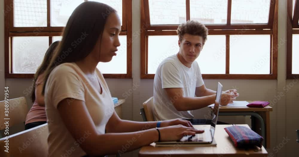 Teenagers in a school classroom Teenagers in a school classroom