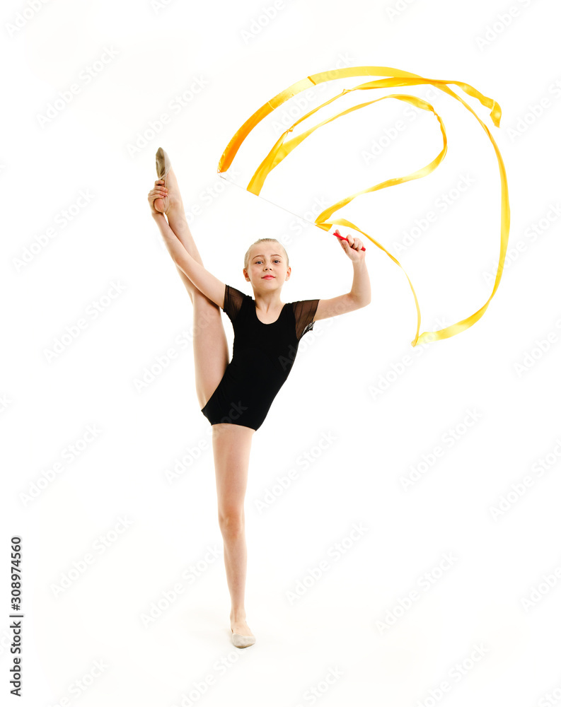 Flexible cute little girl child gymnast doing acrobatic exercise with ...