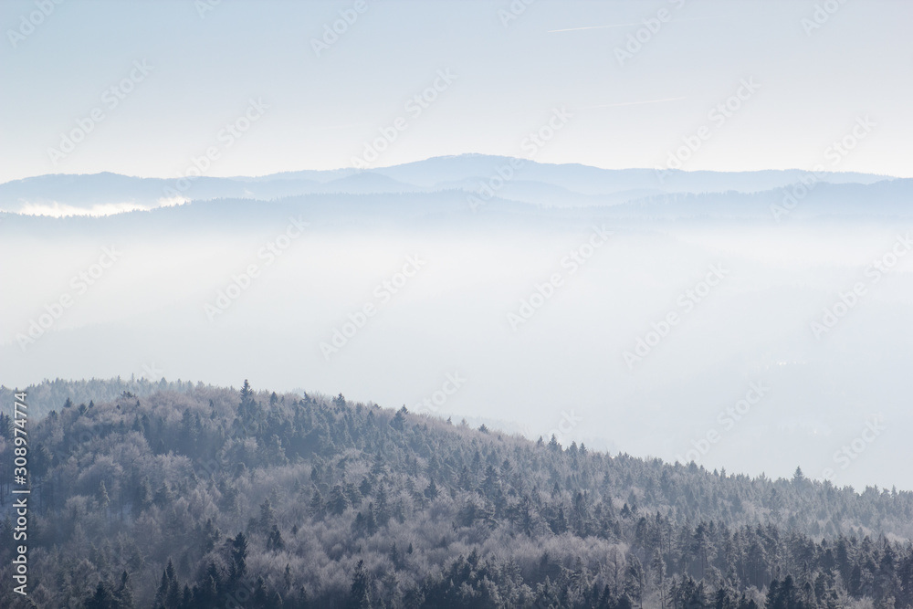 Mist and Fog in Beskid Sadecki Mountains in winter. View from Jaworzyna Krynicka, Poland. Mist and Fog in Beskid Sadecki Mountains in winter. View from Jaworzyna Krynicka, Poland.
