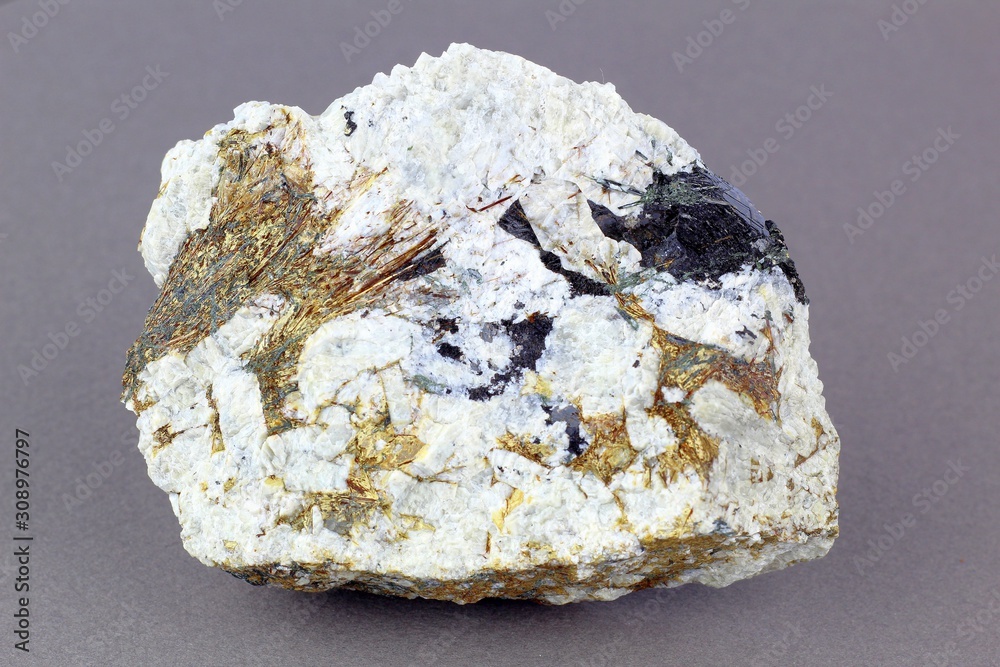 Natural stone astrophyllite. With inclusions of sherl in the rock albite. Natural stone astrophyllite. With inclusions of sherl in the rock albite.