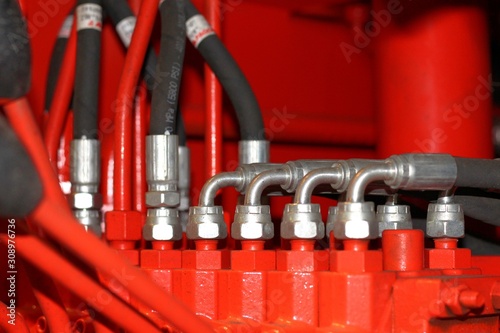 High pressure hydraulic hoses connected to the manipulator control system