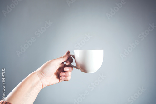 woman hand cup of coffee