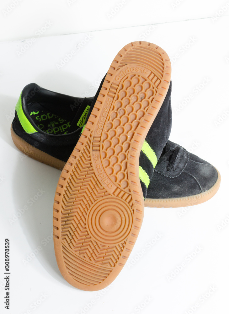 london, england, 05/05/2018 Adidas Originals Bermuda Core Black Gum Casuals Not Malmo Dublin Trainers vintage sneaker trainers. stylish retro football street fashion. adidas gum sole Stock Photo | Adobe Stock