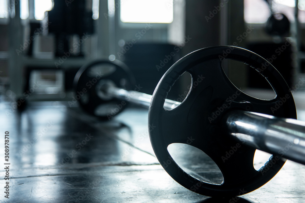 Diverse equipment and machines at the gym workout room for building body and healthy.  Healthy sport Concept