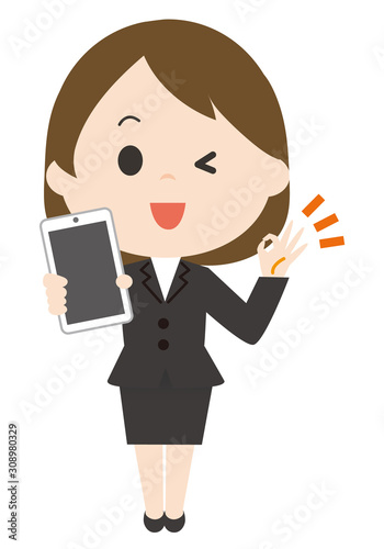 女性　スマートフォン　バッチリ　スーツ