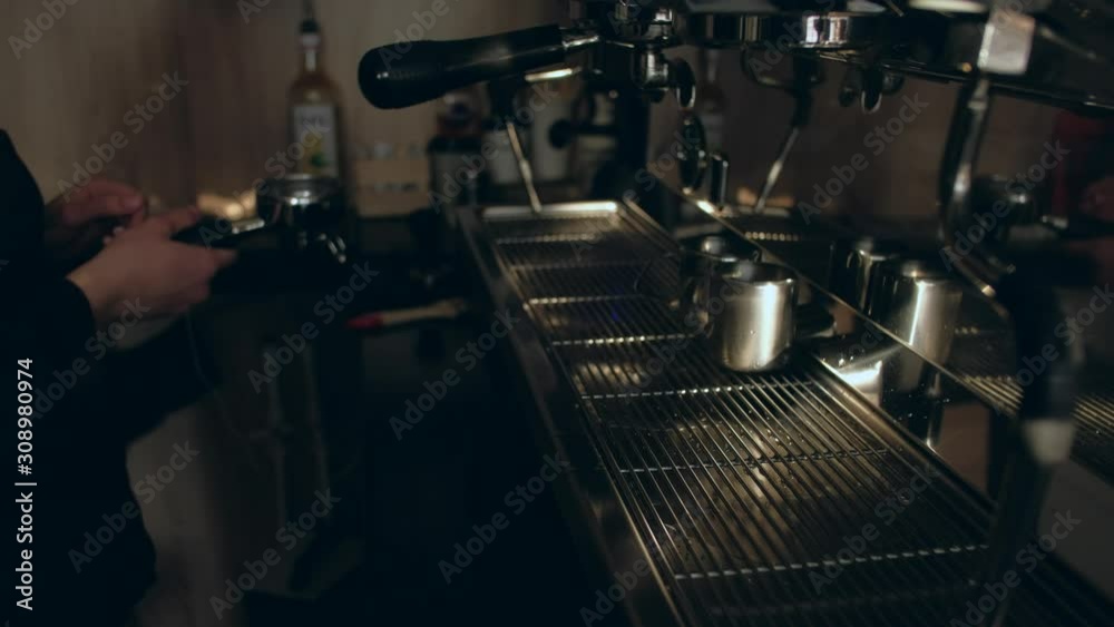Barista at the coffee machine. Clean Water. 4k. Barista at the coffee machine. Clean Water. 4k.