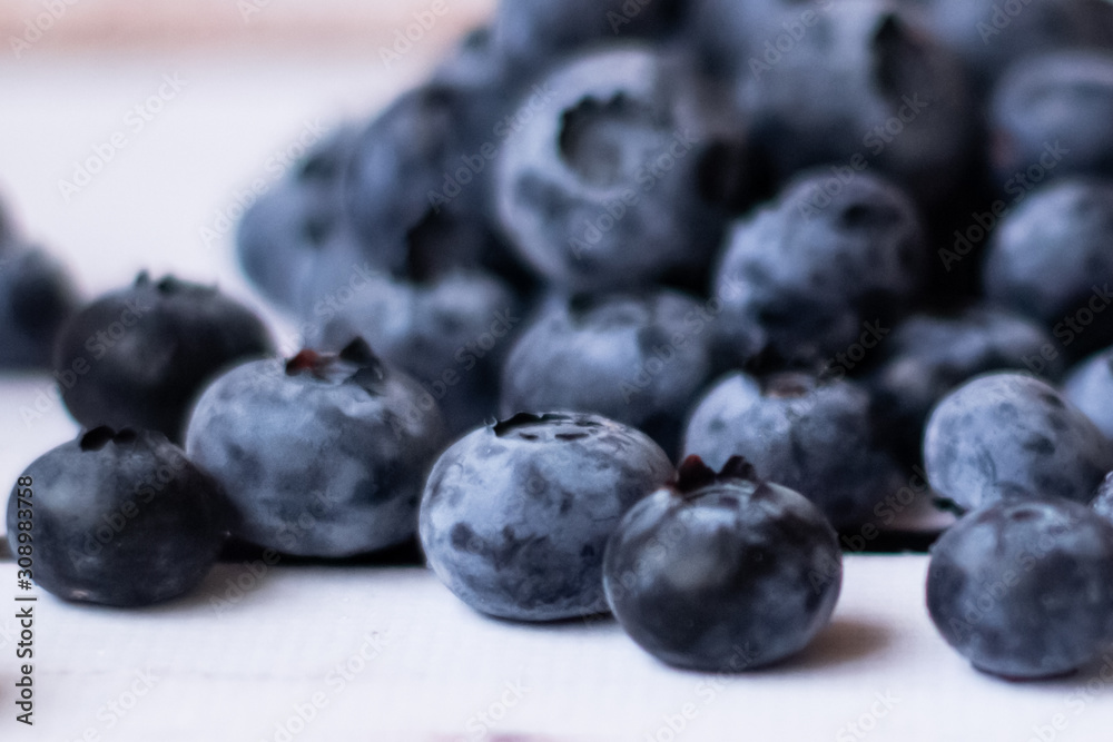 Fresh blueberries on a white background.