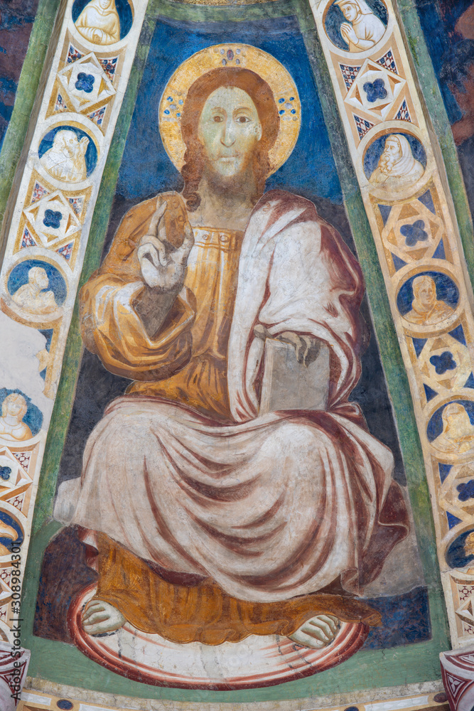 COMO, ITALY - MAY 9, 2015: The old fresco of Jesus the teacher in church Basilica di San Abbondio by unknown artist 