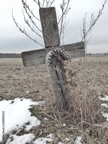 Cross in a field photo