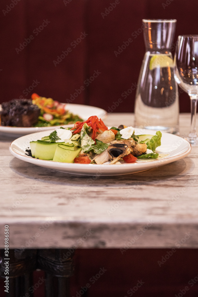 Mushroom garden vegetable salad on the restaurant table Mushroom garden vegetable salad on the restaurant table