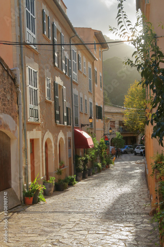 A street of the old village of Valldemossa in the mountains of the island of Palma de Mallorca. © scena15