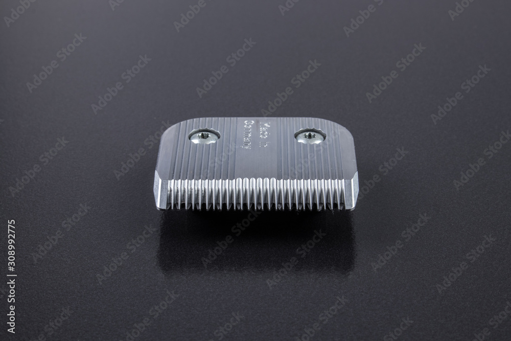 Moving part of a trimmer blade block Moving part of a trimmer blade block