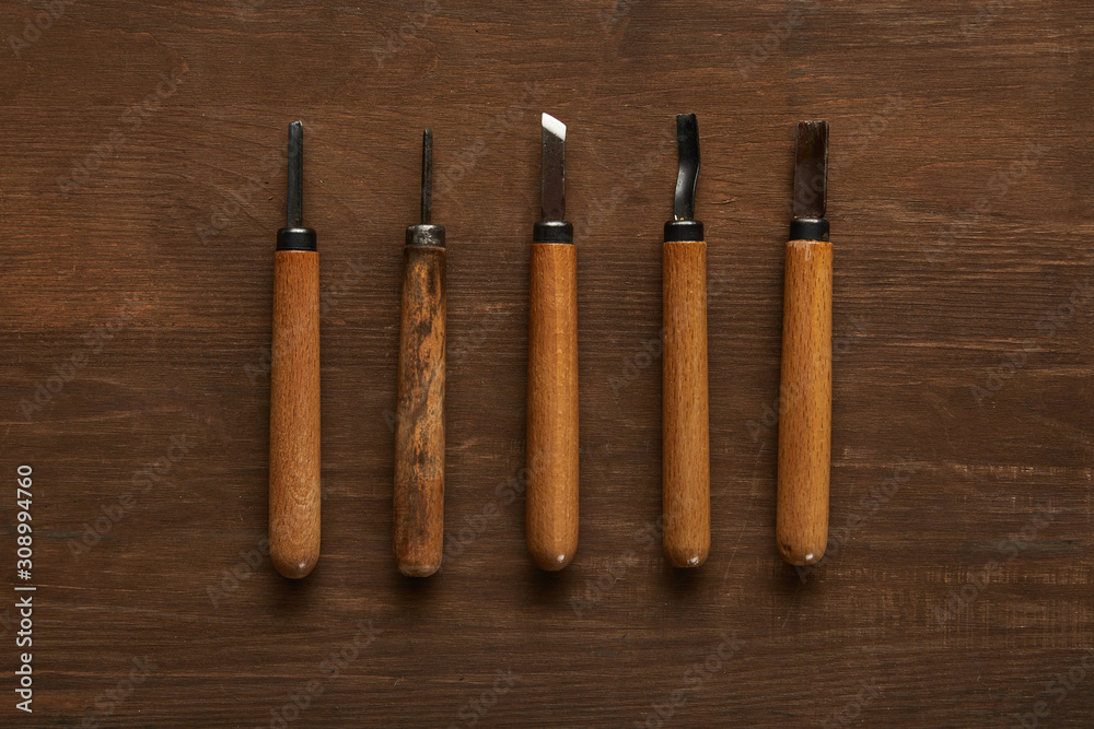 top view of carpentry tools on wooden table top view of carpentry tools on wooden table