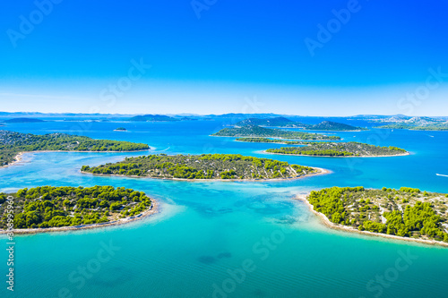 Croatian coastline, small islands in Murter archipelago, aerial view of turquoise bays from drone, touristic paradise on Adriatic sea
