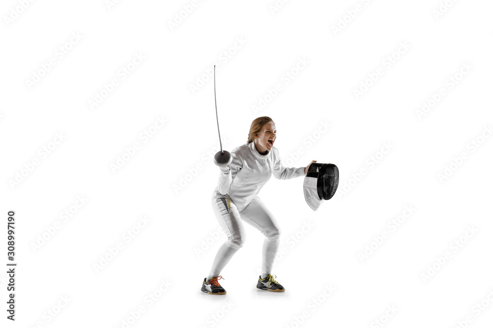 Obraz premium Close up of teen girl in fencing costume with sword in hand isolated on white studio background. Young female model in motion, action. Celebrating win emotional. Sport, youth, healthy lifestyle.