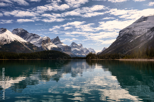 Canadian rockies with blue sky reflection on Maligne lake in Jasper national park