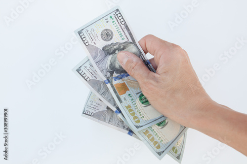 USA Banknote in human hand isolated on white background