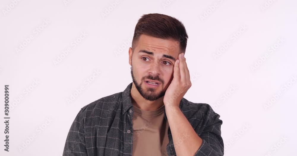 Confused handsome young man on white background Confused handsome young man on white background