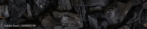 coal background. charcoal woody black. lot of wood