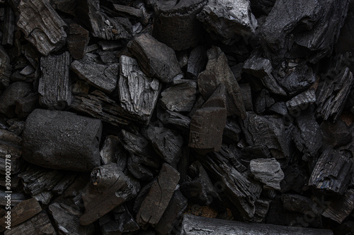 coal background. charcoal woody black. lot of wood