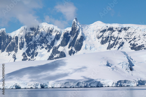 Snow-capped mountains on an island along the coasts of the Antarctic Peninsula, Palmer Archipelago, Antarctica © Marco Ramerini