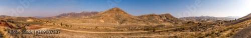 Panoramic view of the wavy, arid and colorful landscape of Painted Hills