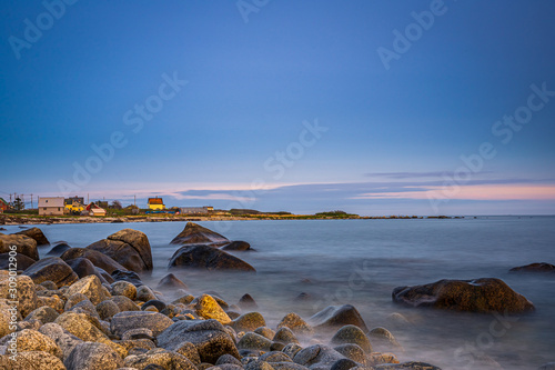Fotografie Long exposure sunset seascape of a Nova Scotia beach at dusk