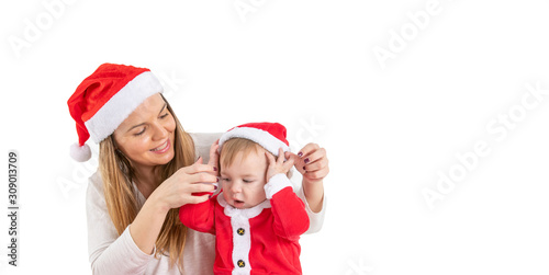 tudio photo with a white background of a mother and child dressed for Saint Claus