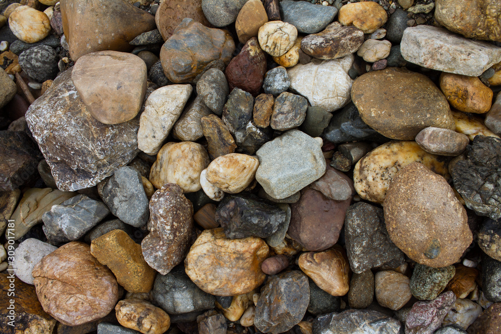 texture of small stones of different colors and shapes