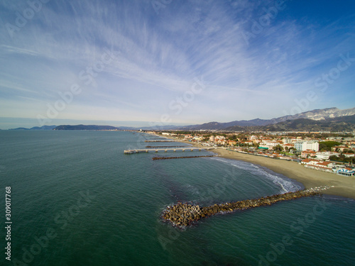 Aerial view in Marina di Massa: the beach and the pier in winter version