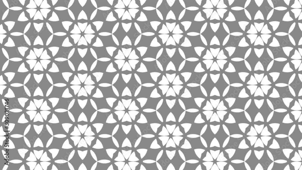 Graphic motif in black and white composed of floral motifs with stroboscopic and hypnotic effect, which rotates clockwise and increases in size