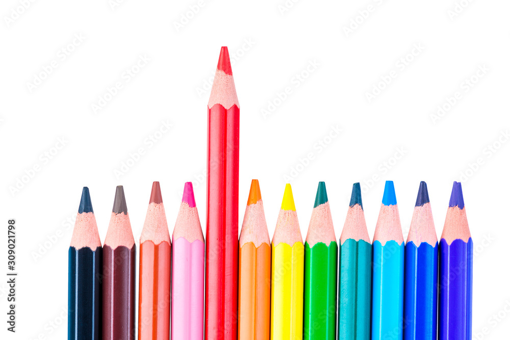concept photo of a red pencil stand out from a row of colored pencils on a white background isolated - obrazy, fototapety, plakaty 