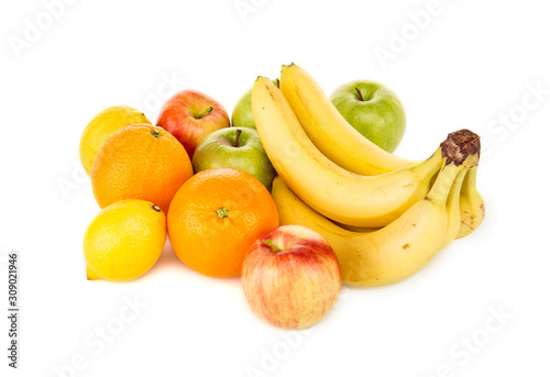 ripe bananas, lemons, oranges and green apples isolated on white