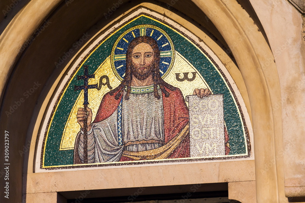 Obraz premium Jesus Christ holding book with Latin inscription Ego Sum Ostium meaning I am the gate, Emmaus monastery Na Slovanech, Abbey Church of the Blessed Virgin Mary, St. Jerome and Slavic Saints, Prague, Cze