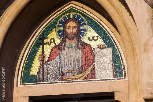 Jesus Christ holding book with Latin inscription Ego Sum Ostium meaning I am the gate, Emmaus monastery Na Slovanech, Abbey Church of the Blessed Virgin Mary, St. Jerome and Slavic Saints, Prague, Cze photo
