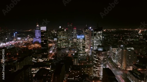 Wallpaper Mural Warsaw Poland. 13. December. 2019. Aerial view of the night city with skyscrapers and busy streets with traffic jams during rush hour. Torontodigital.ca