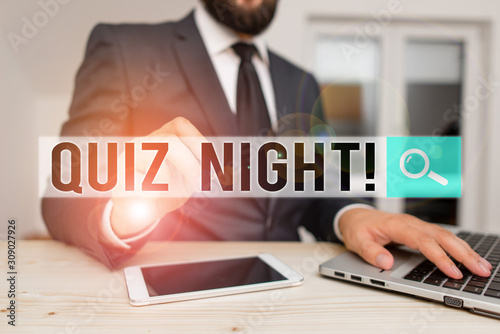 Word writing text Quiz Night. Business photo showcasing evening test knowledge competition between individuals Male human wear formal clothes present presentation use hi tech smartphone