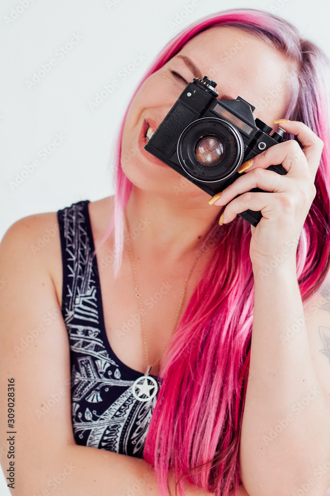 girl with pink hair photographs camera pinup style girl with pink hair photographs camera pinup style